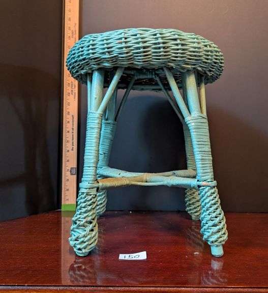 Turquoise wicker stool(located in ds back bedroom)