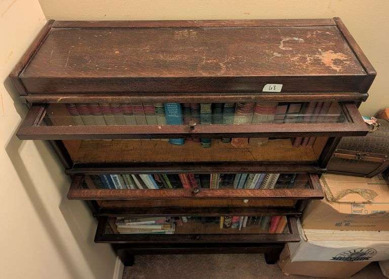 Vintage 3 Shelf  lawyer book case 34"x11.5"x52" tall, some damage on top, contents not included(stai