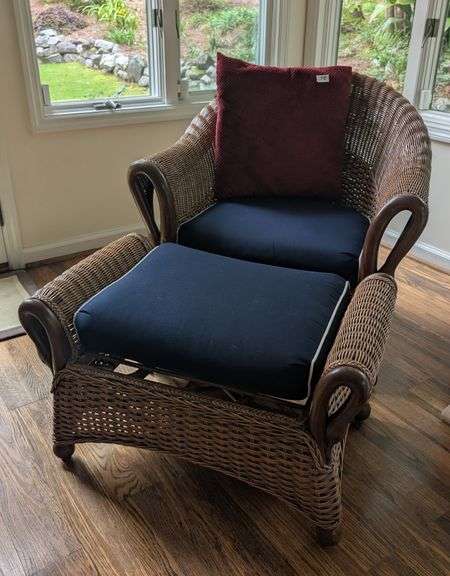 Wicker armchair,32" tall, 29" wide with matching ottoman, 30"x19"x19"(sunroom)