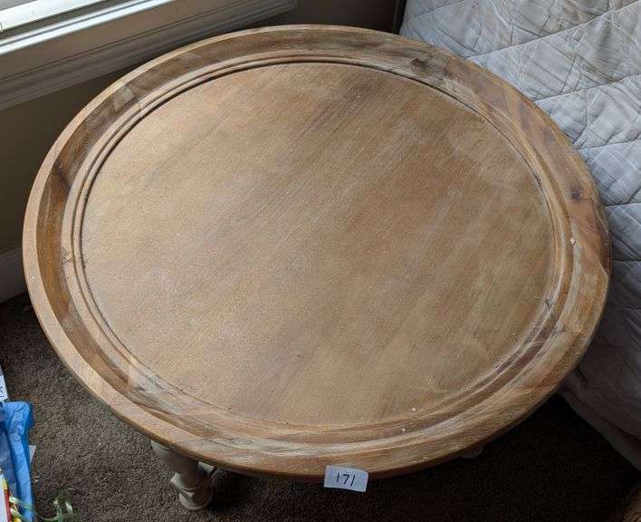 Pier 1 wood round top coffee table, made in Vietnam, 33" diameter 19" tall(located in DS front bedro