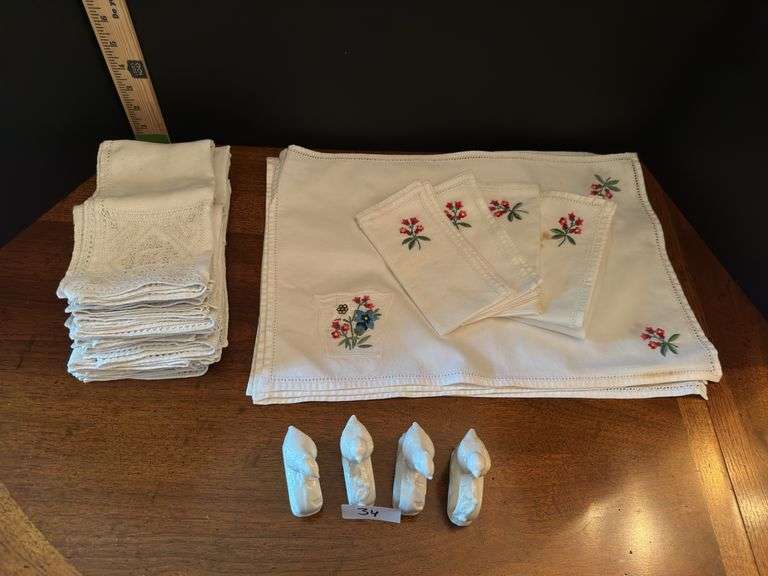Napkins, place mats and napkin rings ( located in drawer in china cabinet)