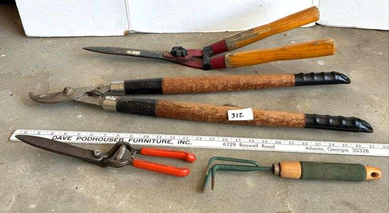 4 pc Loppers, Garden Hand Rake, and Hand Trimmers  (Located Garage)