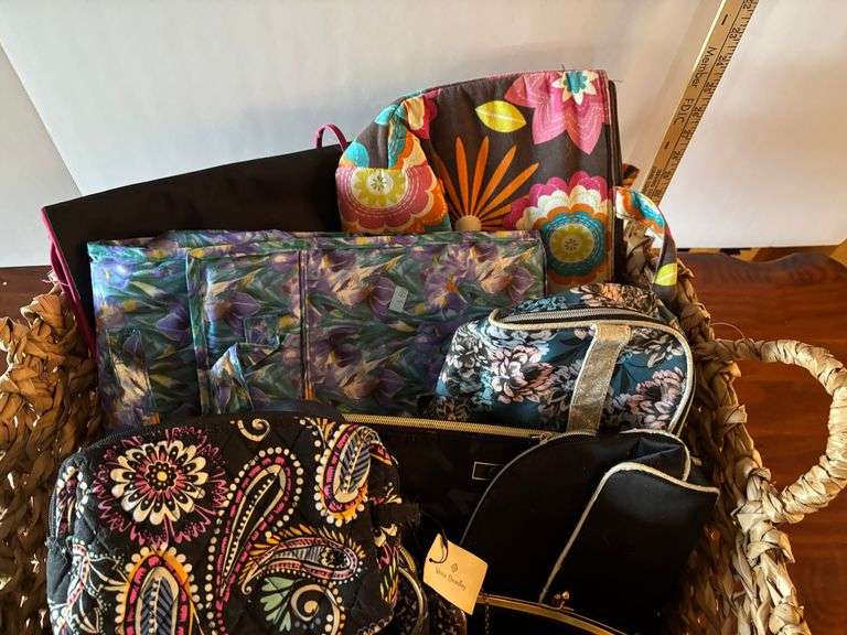 Basket of Cosmetics Bags, Purses, Packing Cubes (Vera Bradley, etc. Located in Living room)