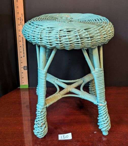 Turquoise wicker stool(located in ds back bedroom)