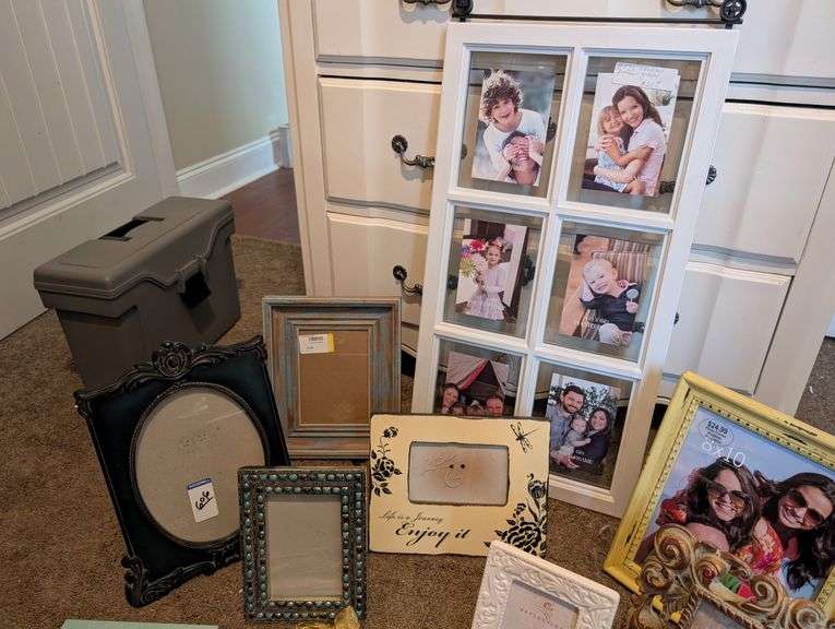 12 pc picture frames and mirror(located in ds back bedroom)