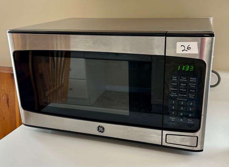 GE Microwave 11 3/4”x20 1/8”14 1/4” (Located in Kitchen)