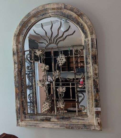 Wood frame and metal scrollwork decorative mirror27"x37"tall(located in dining room)