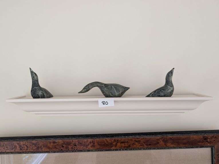 4pc. Decorative shelf, 24"x4"tall with 3 signed green stone carving of seals, tallest seal 3.5"tall(