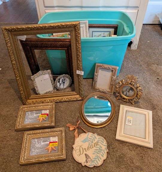 Tote of frames, mirror, and decor(located in ds back bedroom)