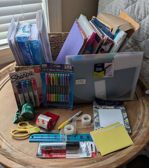 Basket of office supplies(located in DS front bedroom)