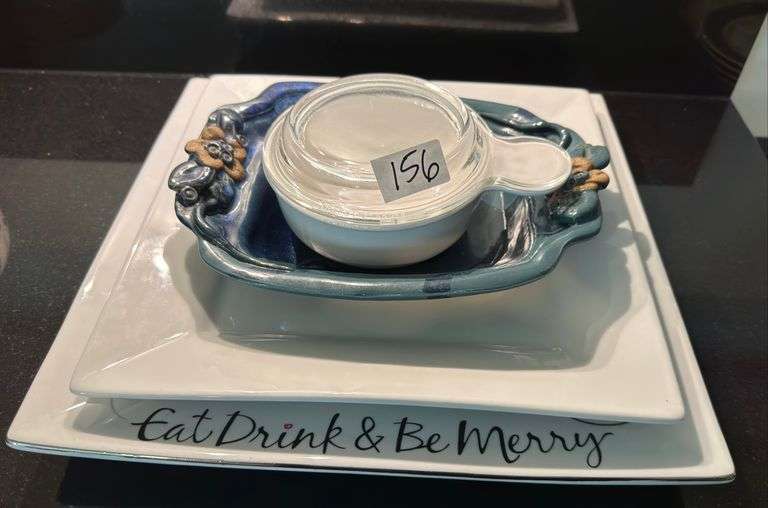Palms up pottery dish, large ramekin, pair of square trays (located in kitchen)