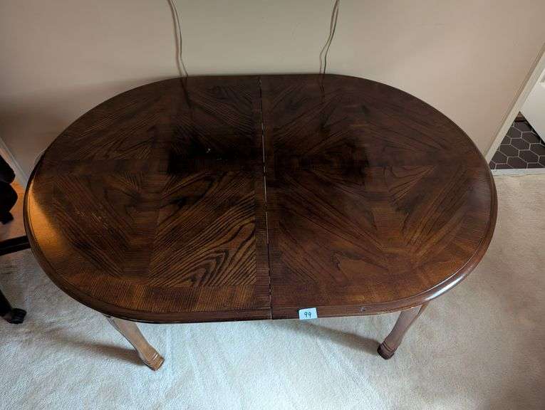 Oval table, 55"x40"x29"tall, (2) leaves 12” (located in upstairs bedroom)