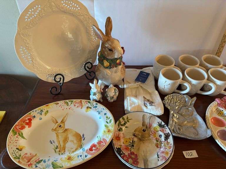 17 pc Easter lot, plates, platters, mugs, egg trays, etc. Stand not included (located in ds back roo