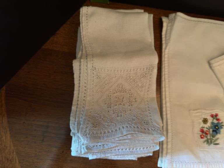 Napkins, place mats and napkin rings ( located in drawer in china cabinet)