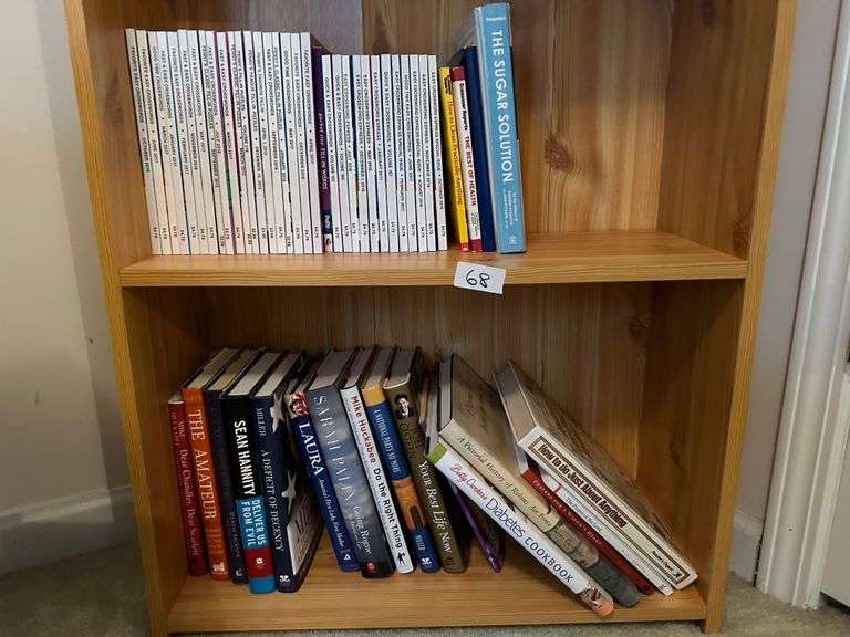 2 Shelf Lot of Books and Crossword Puzzle Books (Located in Bedroom to the Right)
