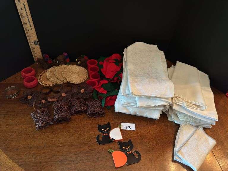 Napkins and napkin rings ( located in drawer in China cabinet)