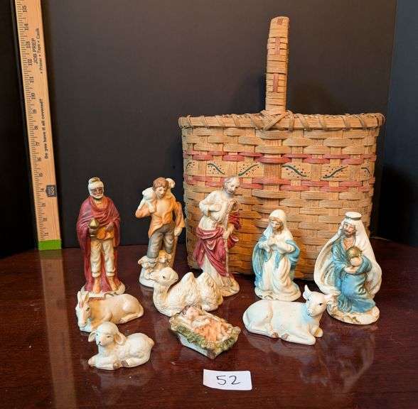 10 pc. figurines with basket (located in ds back bedroom)