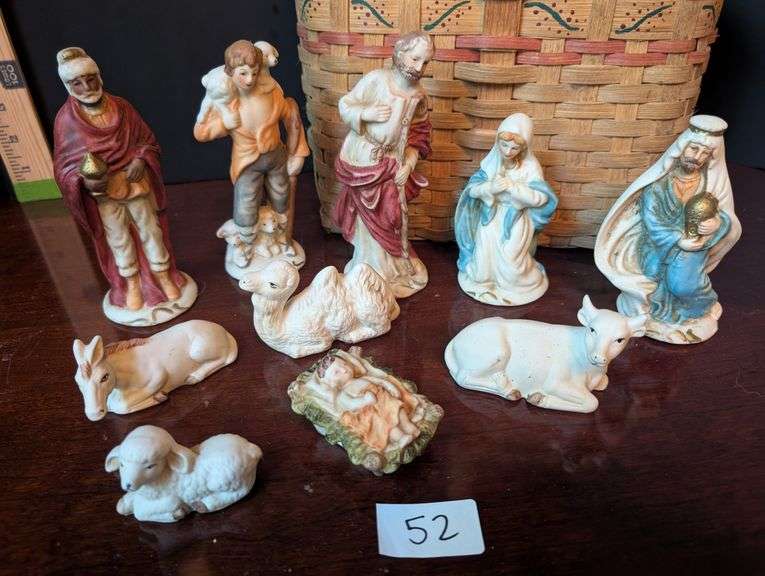 10 pc. figurines with basket (located in ds back bedroom)