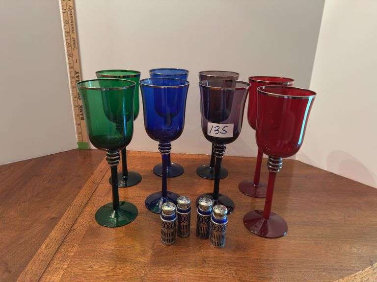 Set of 8 colored wine glasses and 2 salt and pepper sets (located in dining room)