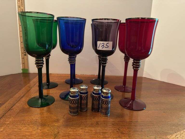 Set of 8 colored wine glasses and 2 salt and pepper sets (located in dining room)