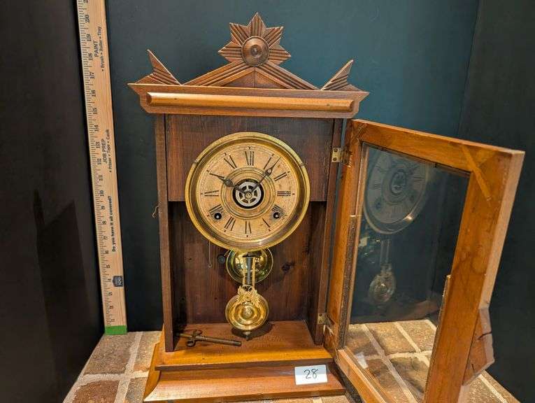 Vintage mantle clock with key(located in family room)