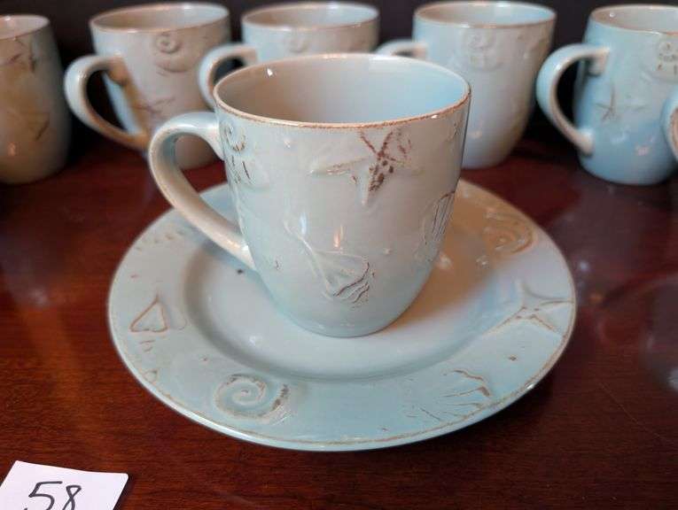 16 pc. Thomson pottery coffee cups and plates(located in dining room)
