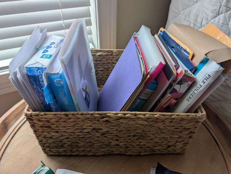 Basket of office supplies(located in DS front bedroom)