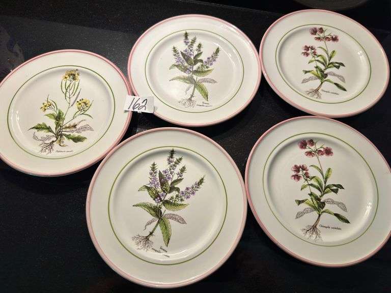 Assortment of 10 plates (located in kitchen)
