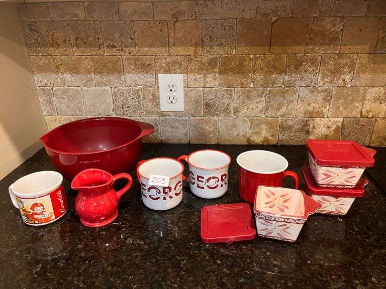 Red mixing bowl, mugs, 3 pc ramekins with lids, and creamer pitcher (located in kitchen)