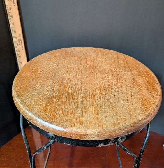 Twisted wrought iron stool wood top(located in DS back bedroom)