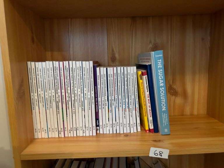2 Shelf Lot of Books and Crossword Puzzle Books (Located in Bedroom to the Right)