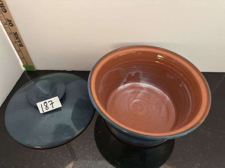 Pottery bowl and pottery covered casserole (located in kitchen)