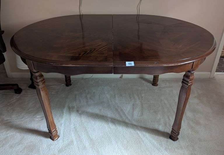 Oval table, 55"x40"x29"tall, (2) leaves 12” (located in upstairs bedroom)