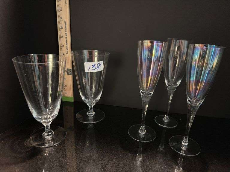 Pair of ice tea goblets and set of 3 champagne flutes (located in dining room)