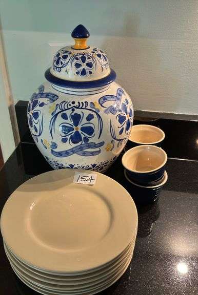 Vintage ginger jar, set of 8 small plates, set of 4 ramekins (located in kitchen)