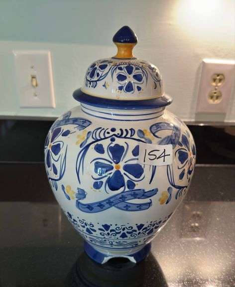 Vintage ginger jar, set of 8 small plates, set of 4 ramekins (located in kitchen)