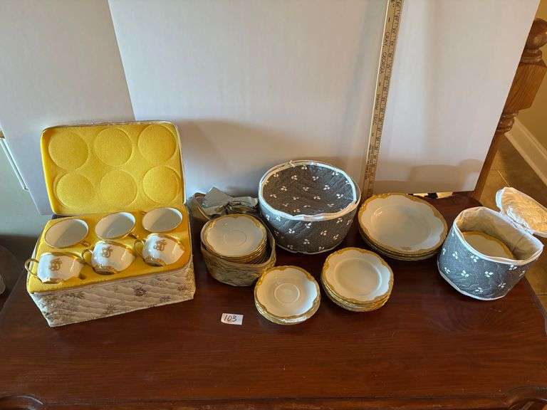 White and Gold Dish Set with Protective Packing Cases. Not a full set. (located in ds back room)