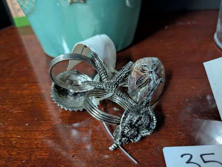 Coastal decor, napkin holders, vase, metal pail with artificial foliage(ds back bedroom)