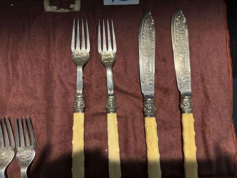 Bakelite fish cutlery (located in dining room)