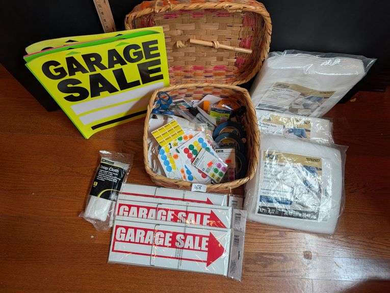 Garage sale basket with supplies(located in front bedroom)