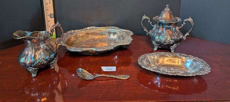 5 pc. Silver plated items, including Oxford silver Plated Co. Spoon(located in dining room)