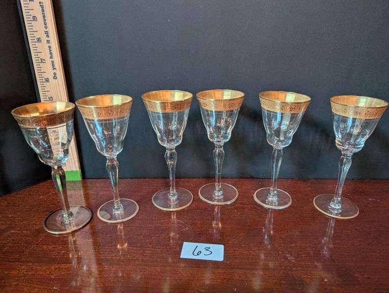 6 pc. Vintage gold rimmed wine glasses(located in dining room)