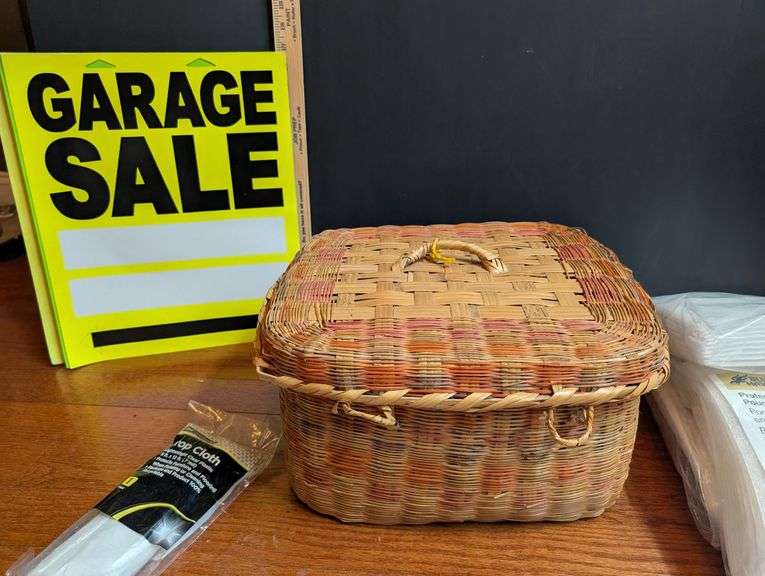 Garage sale basket with supplies(located in front bedroom)