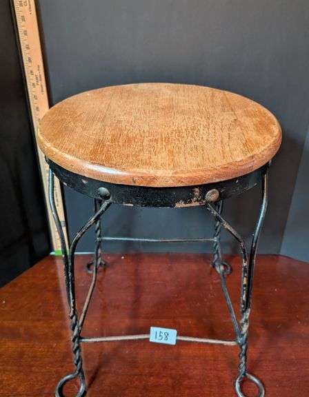 Twisted wrought iron stool wood top(located in DS back bedroom)