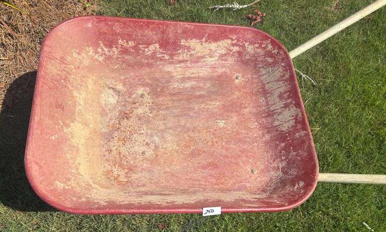 Red and White Wheel Barrow (Located Garage)