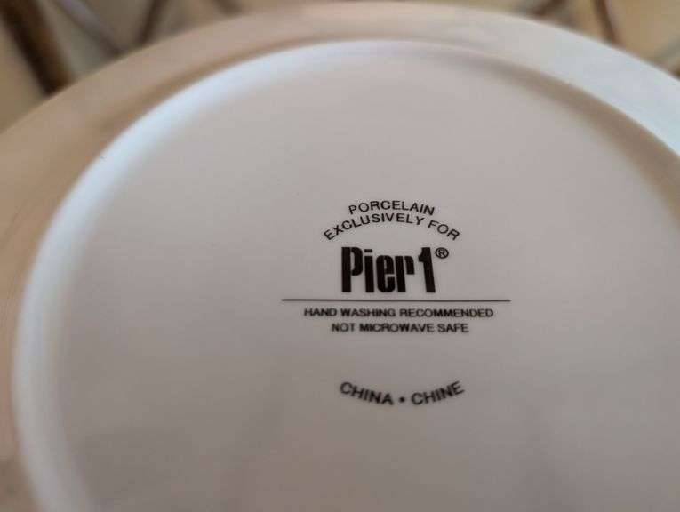 Basket of Pier 1 holiday plate and twisted peppermint lotion, shower gel, fragrance and more(ds back