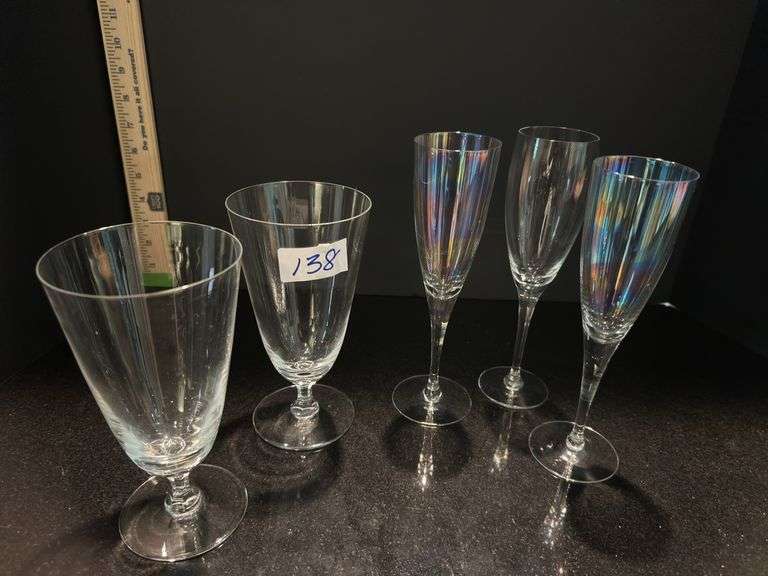 Pair of ice tea goblets and set of 3 champagne flutes (located in dining room)