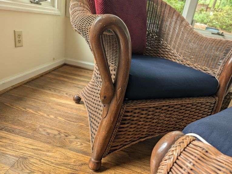 Wicker armchair,32" tall, 29" wide with matching ottoman, 30"x19"x19"(sunroom)