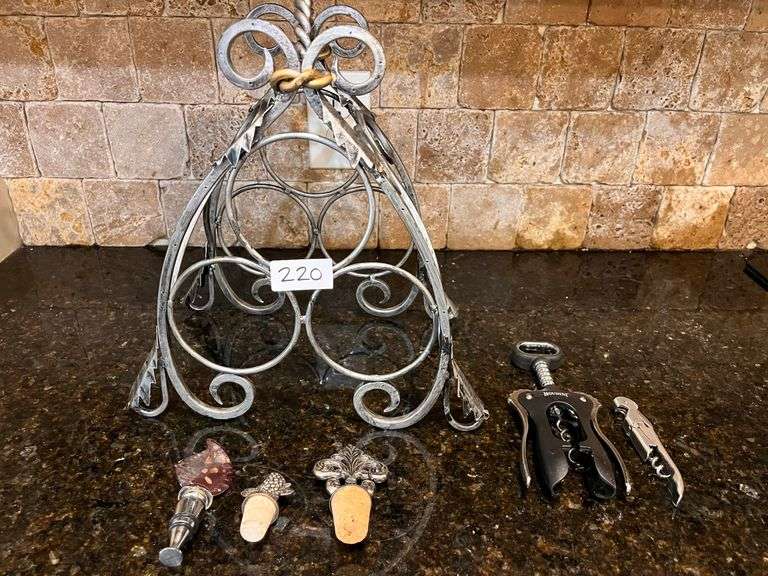 3 bottle wine rack and wine accessories (located in kitchen)