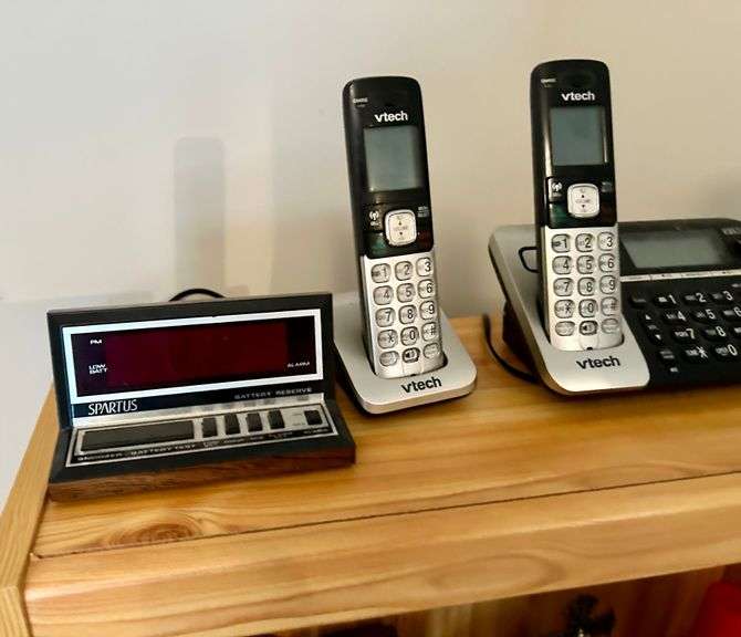 2 Shelf Lot of Phones, Flashlights and More (Located in Bedroom to The Right)